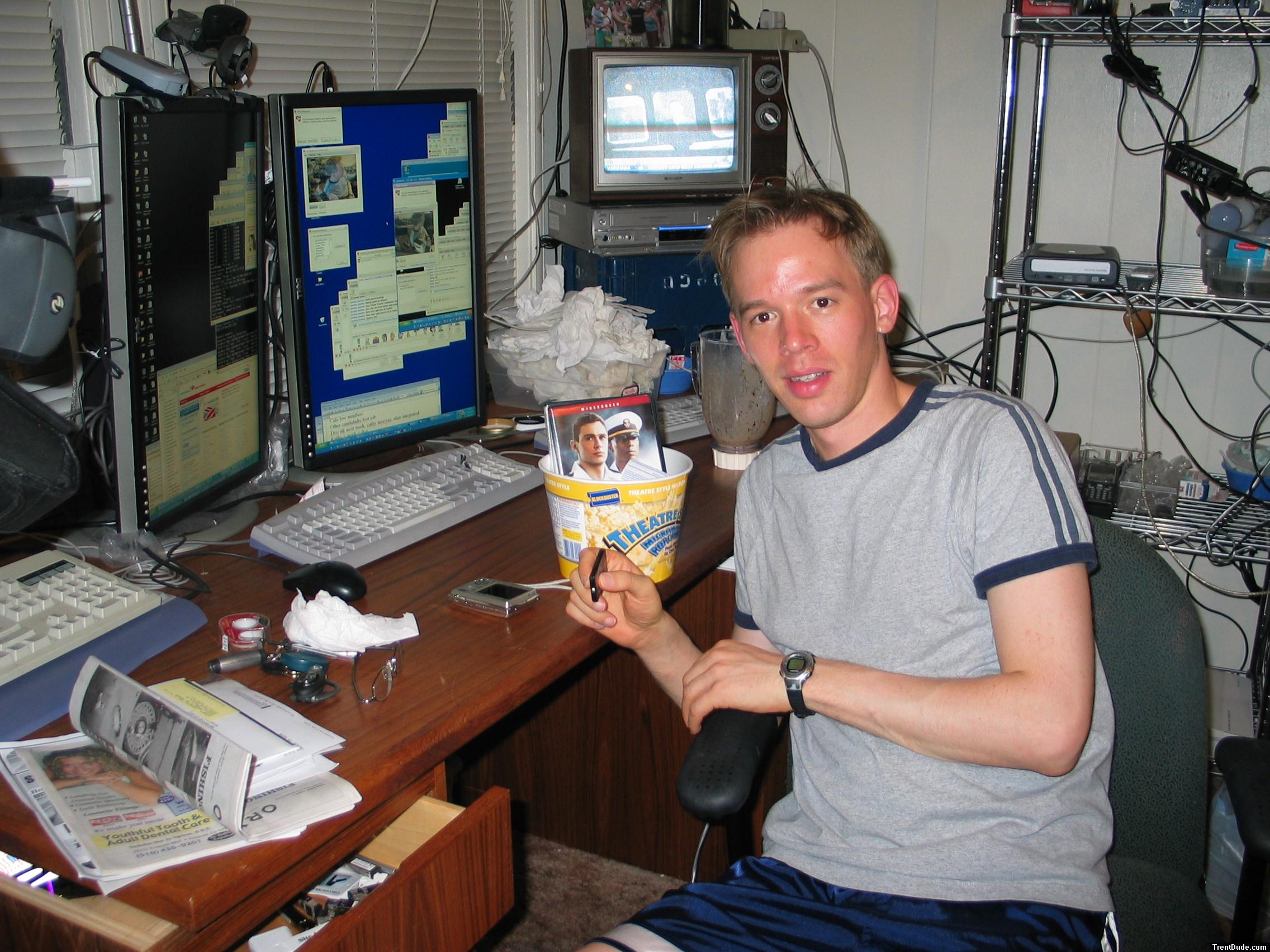 grey t-shirt at the computer