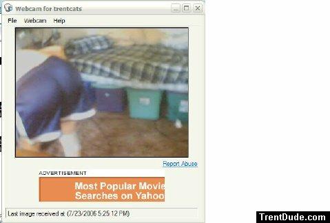 (bending over with shiny shorts on)