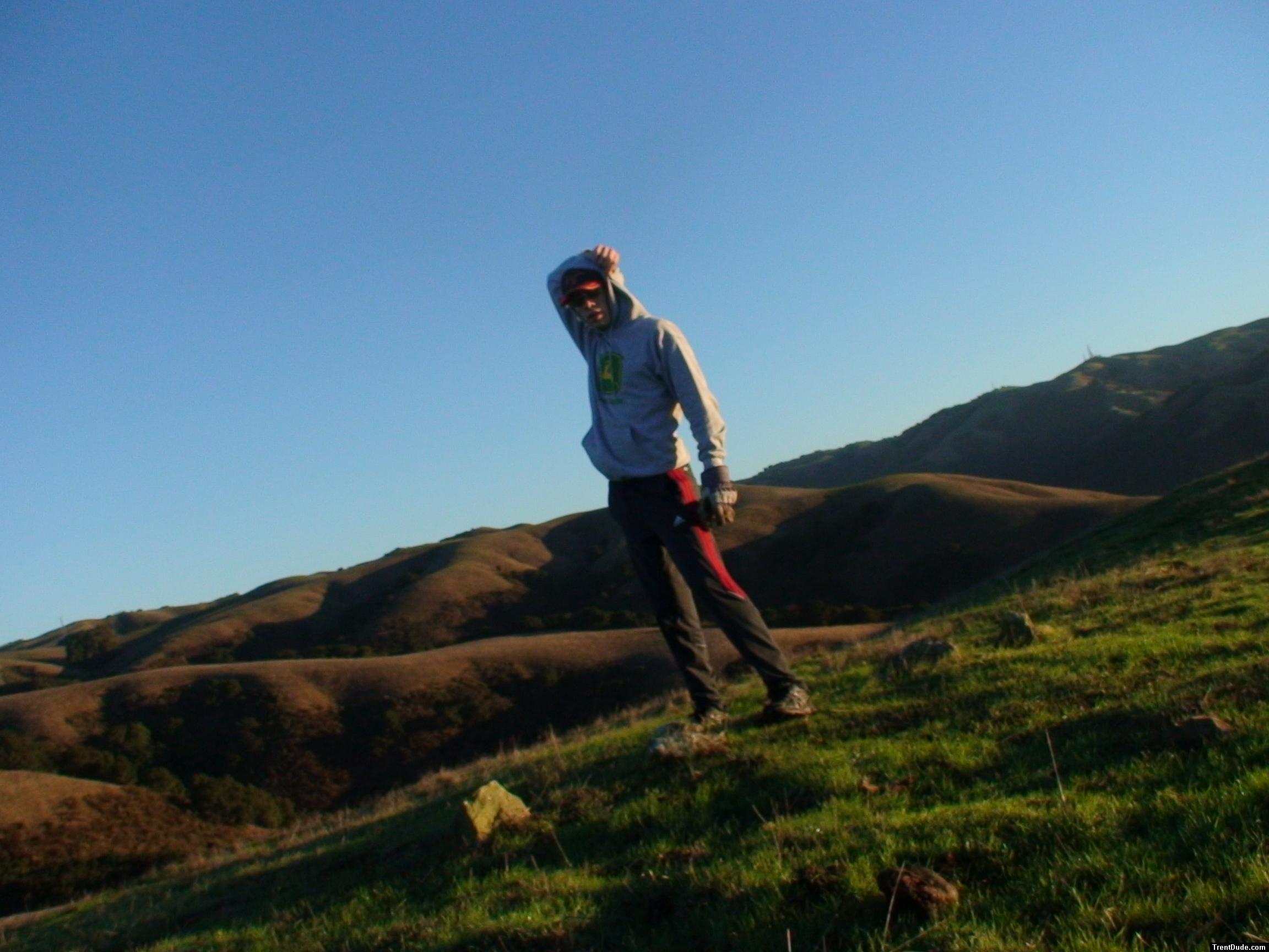 Addidas nylon biking tights and a sweatshirt during a morning sunrise in the mountains