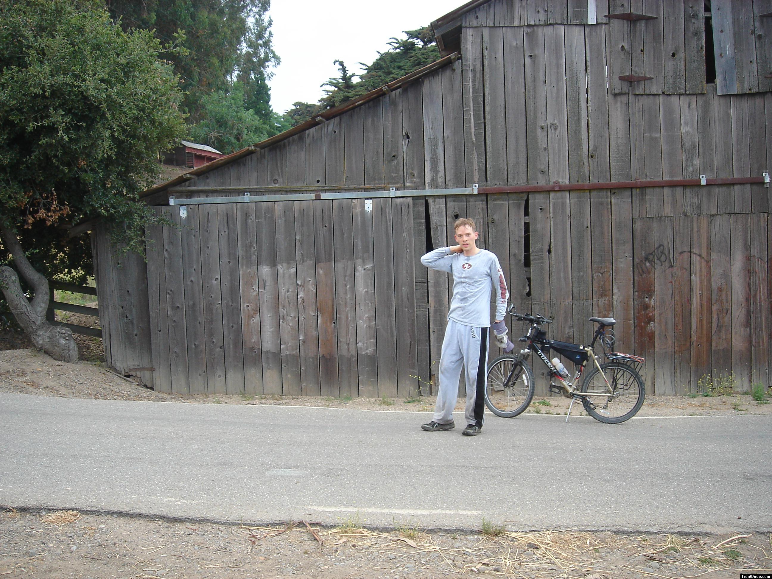 Biking on the farm.  He did 15 miles that day chasing the cows and got all dirty.