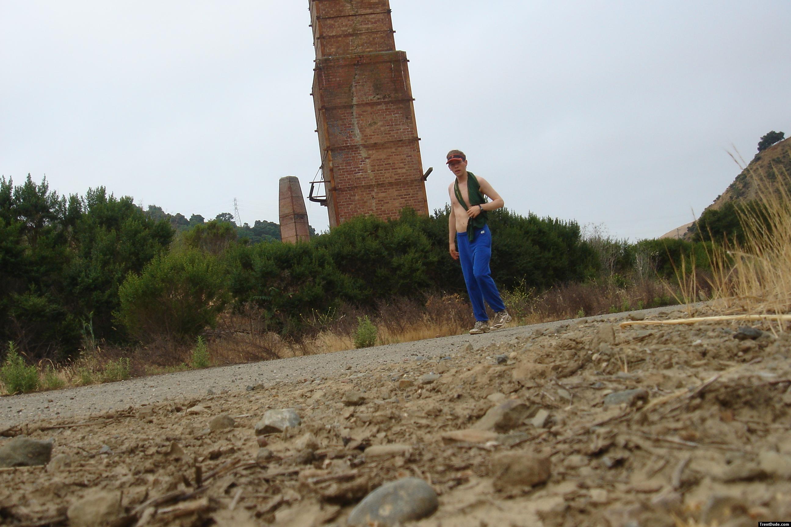 Shirtless in a abandoned brick yard