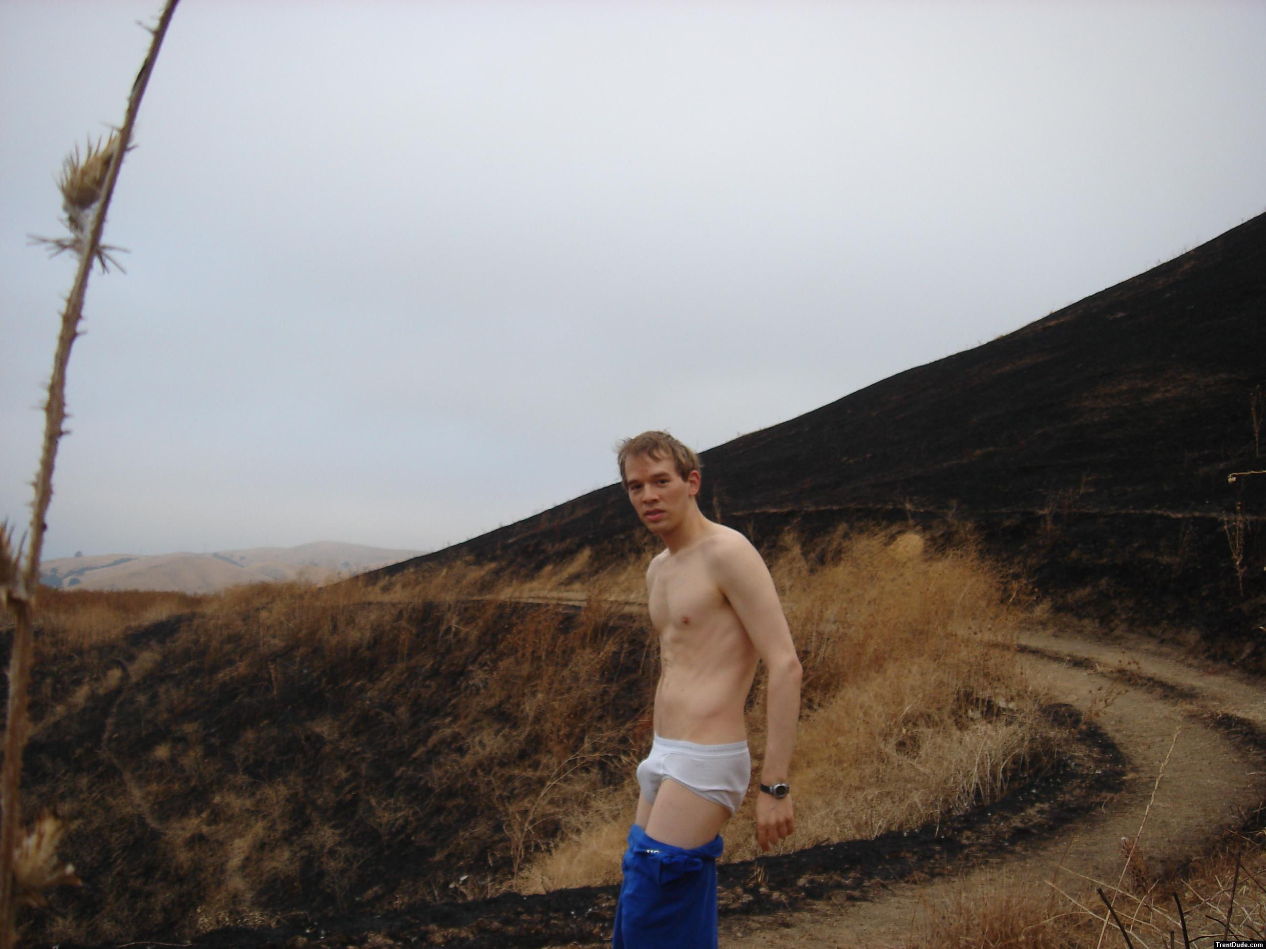 Trent hiker in burned Montana Grassland (i Didn't start that fire) (cooling off in undies on a hot day)