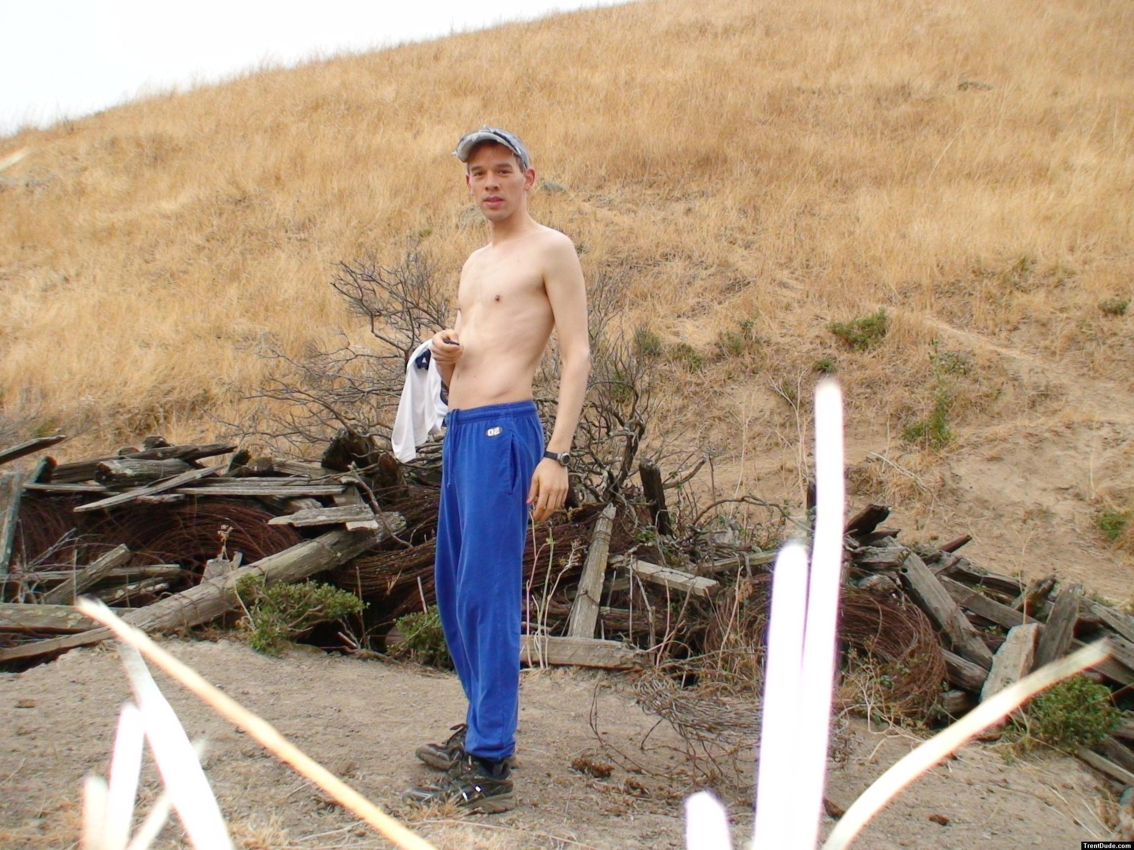 Shirtless in blue sweats