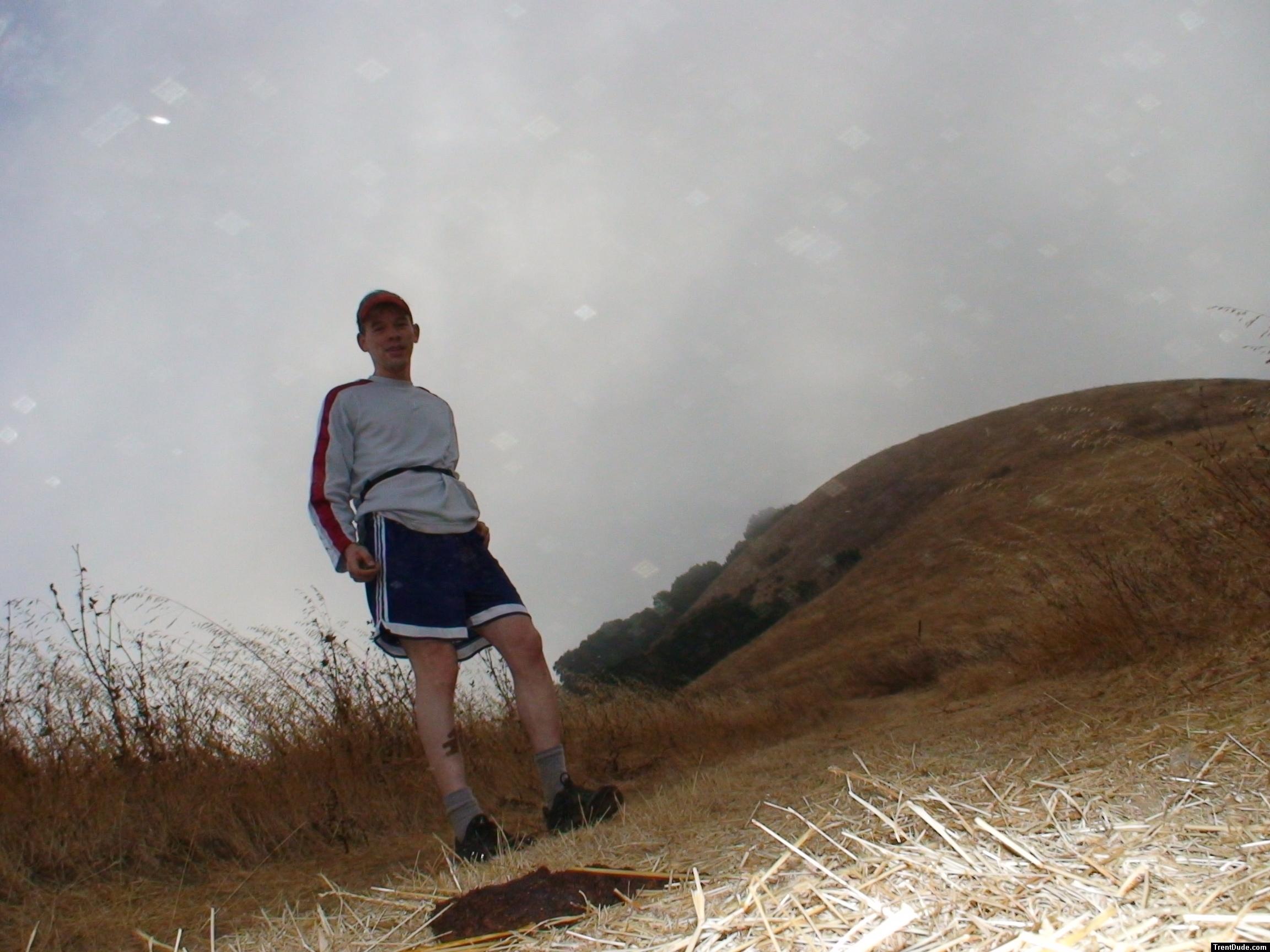 Blue Addidas shorts, Reebok long sleve shirt, on the farm