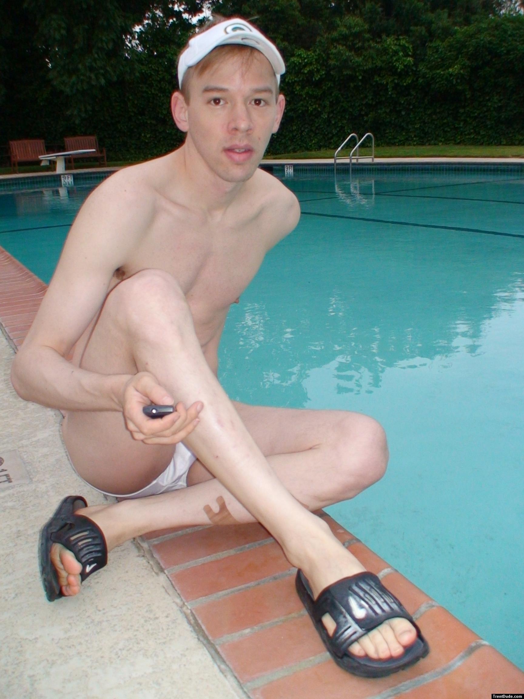 Poolside in a white speedo