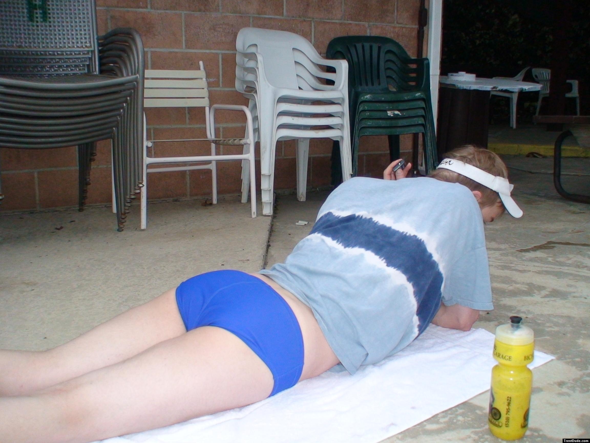Ready to do some push-ups  in Blue Nike swim brief (butt)