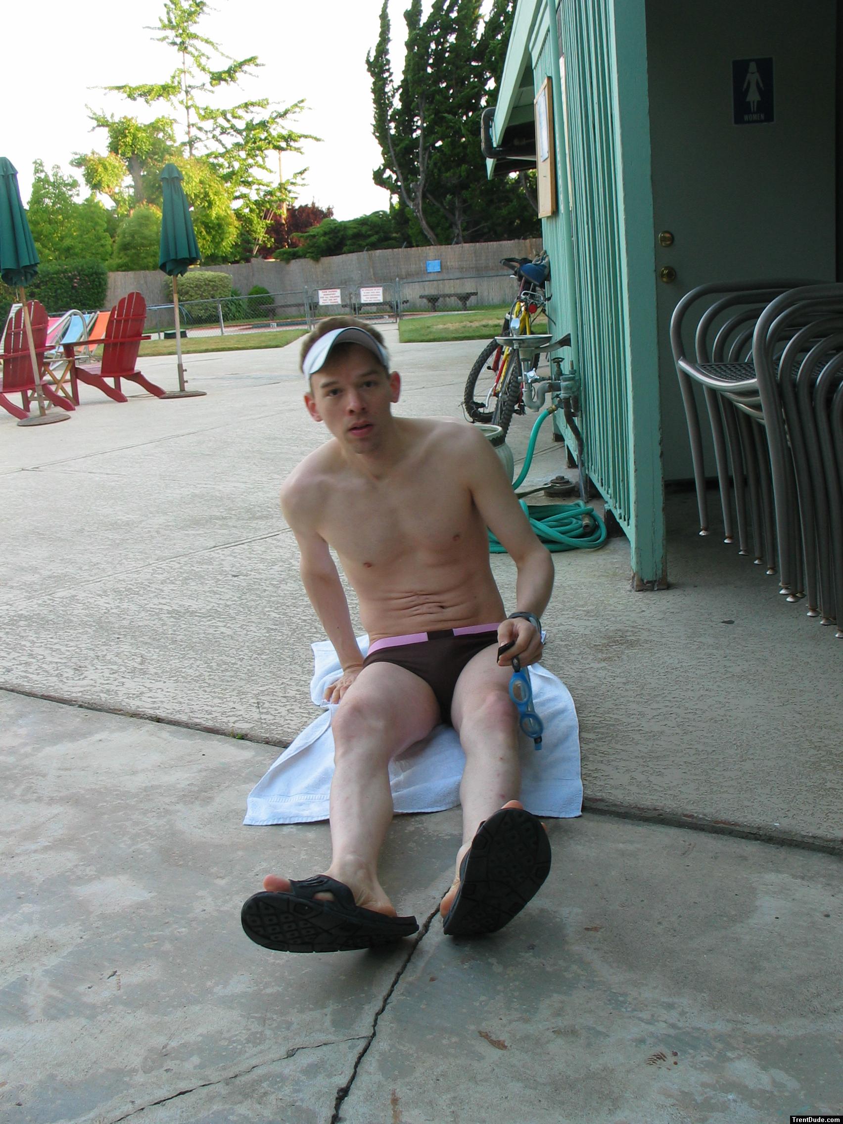 Maybe someone will notice his new swim suit if he lays here on a towel