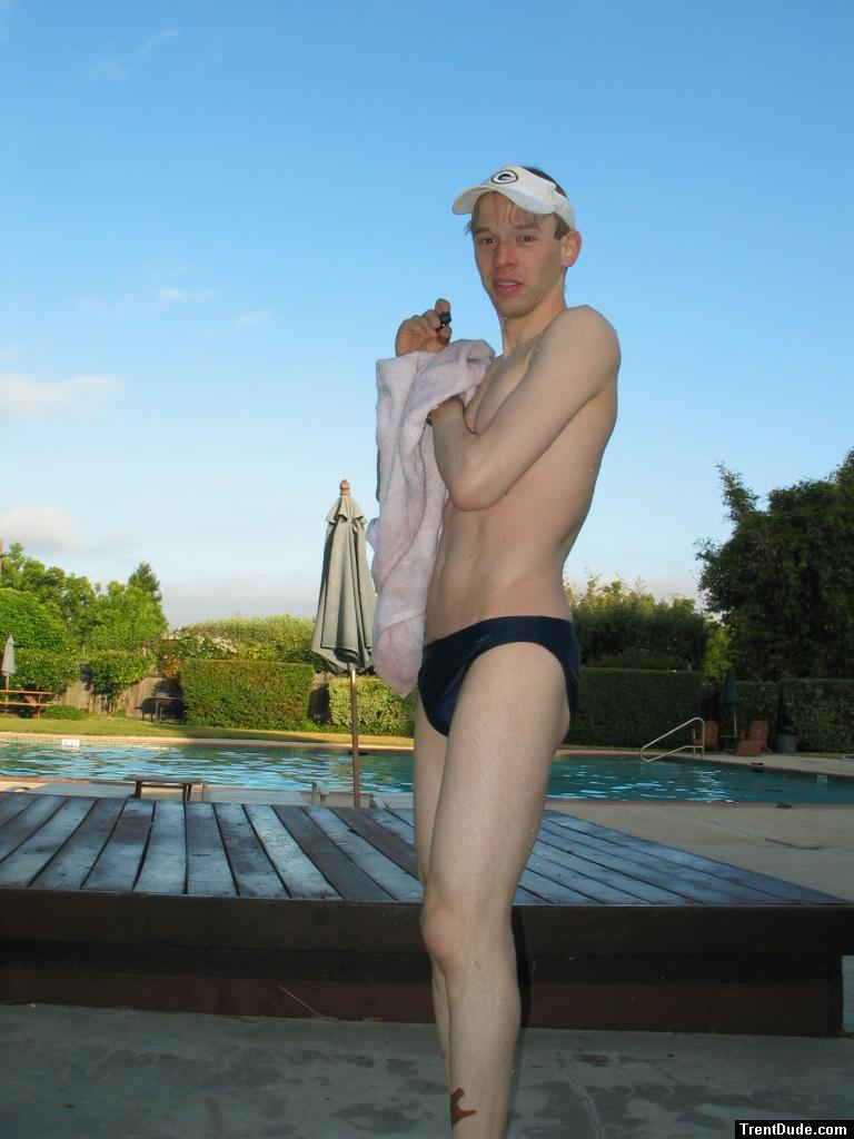 Swimmer showing body in a blue speedo brief