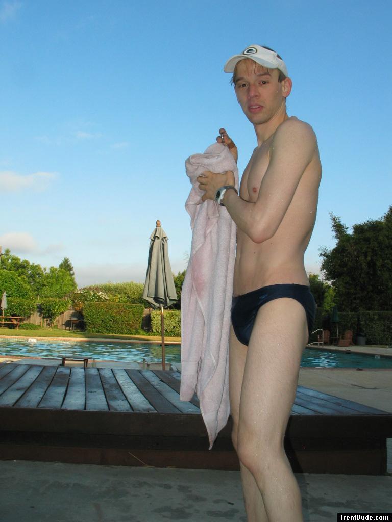 Swimmer showing body in a blue speedo brief