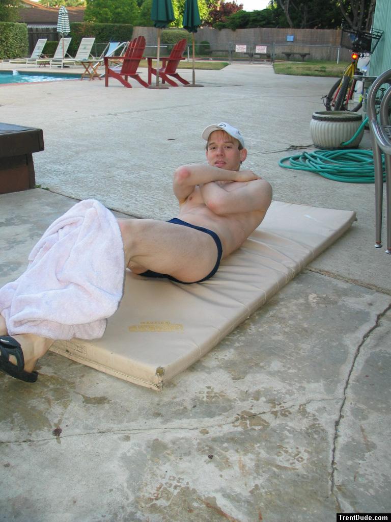 Doing 50 sit-ups in his speedo