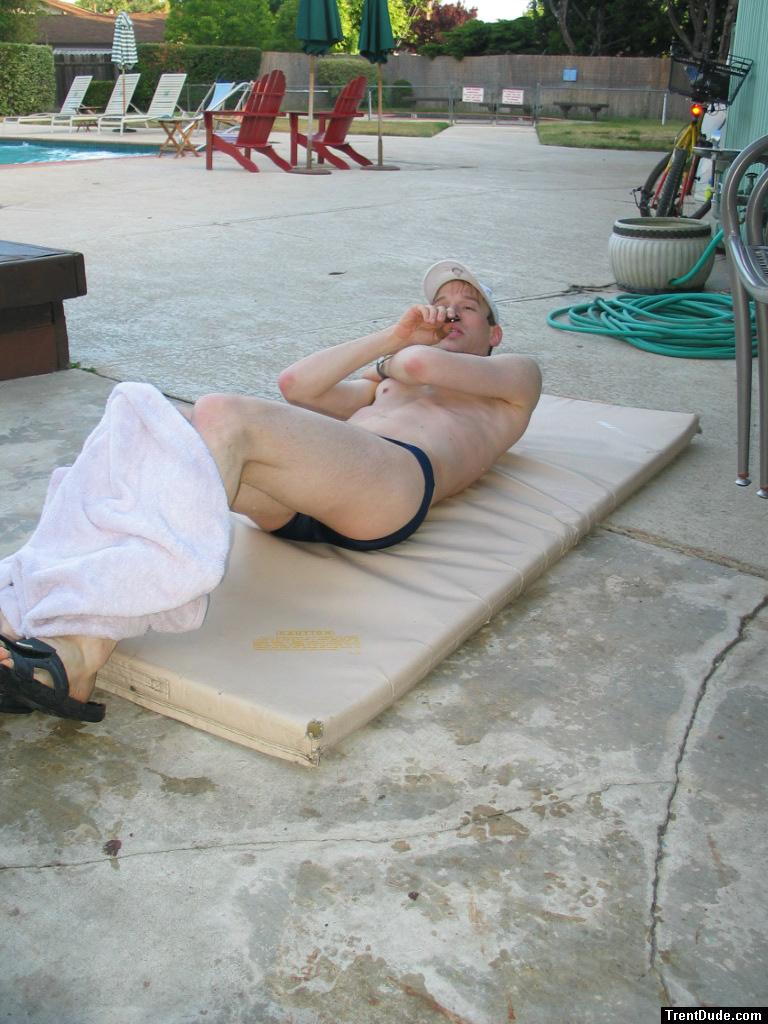 Doing 50 sit-ups in his speedo