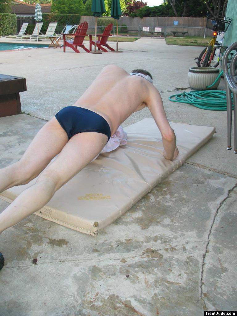 doing a pushup wearing a Speedo Solar 1" Swim Brief from Macys.com