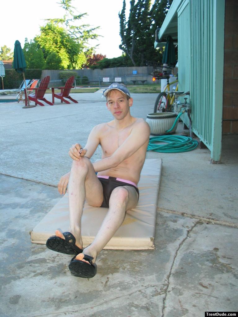 swimmer doing some stretches in Nike Bati Slide slippers