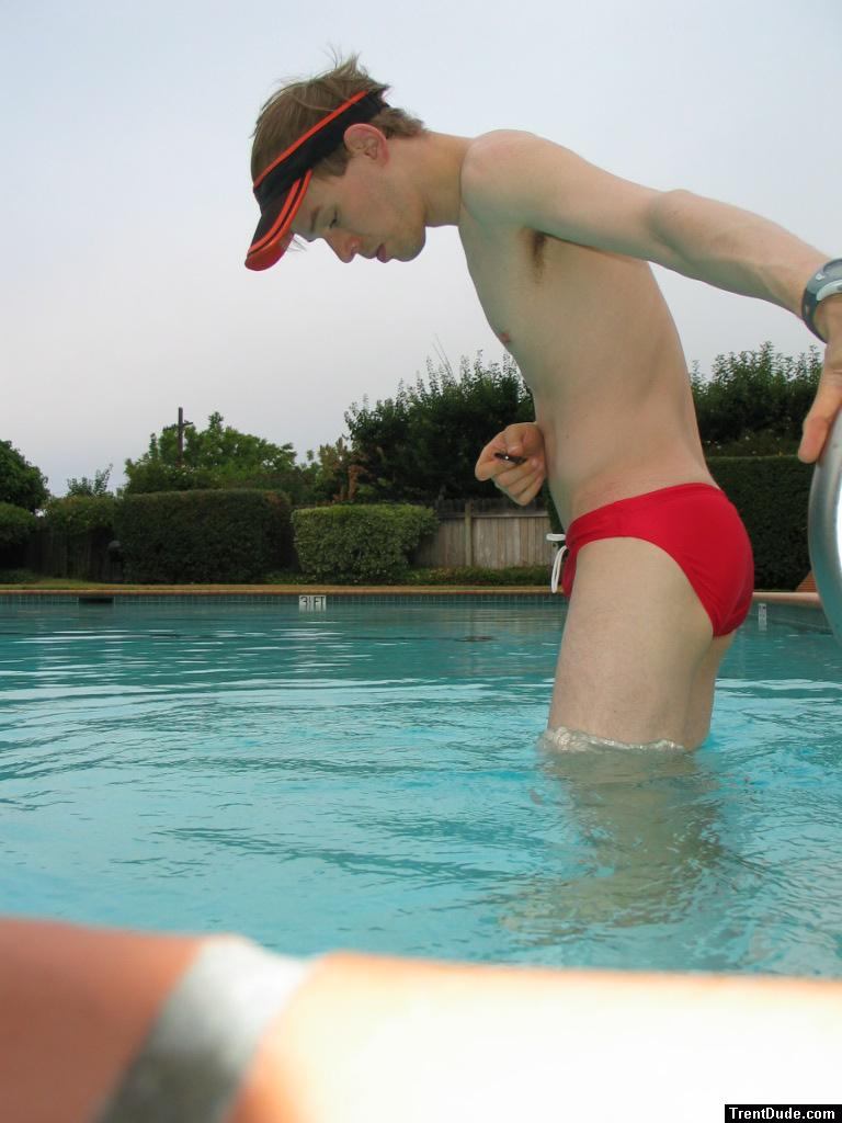 He is checking out the water in his red Speedo (rear) (best!)