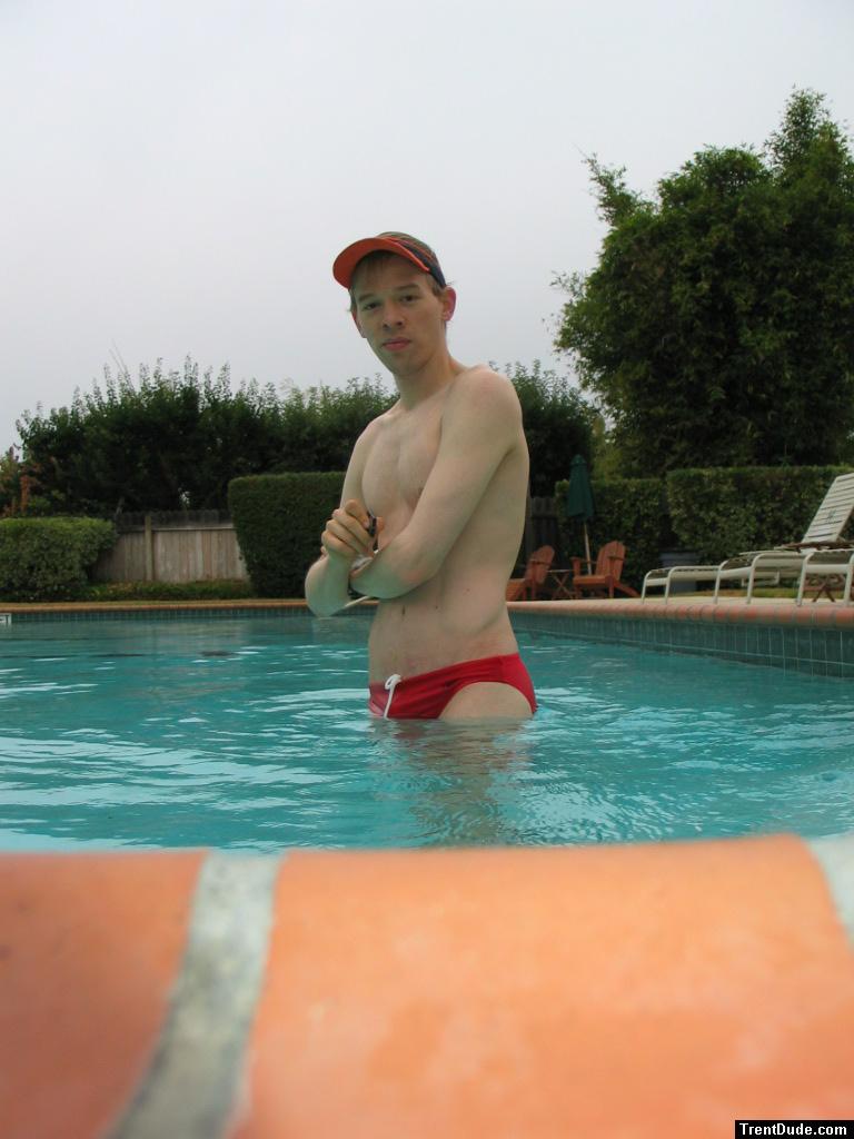 Smiling in his red speedo