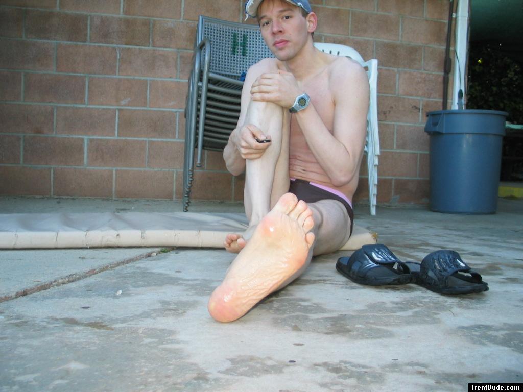Hugging his leg