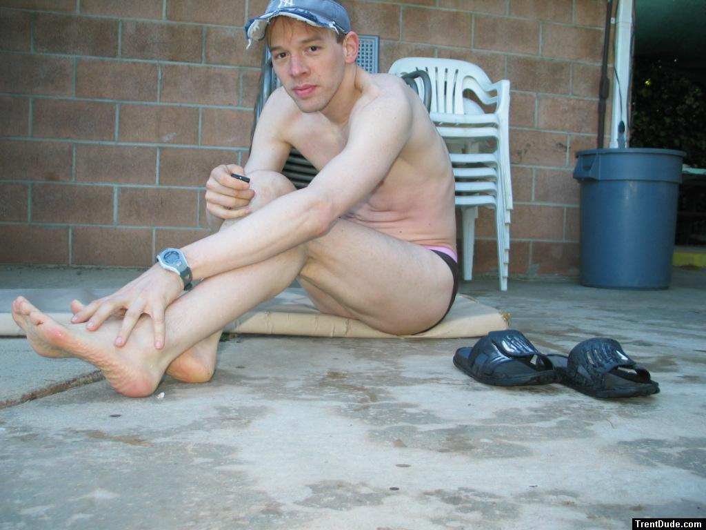 Grabbing his feet
