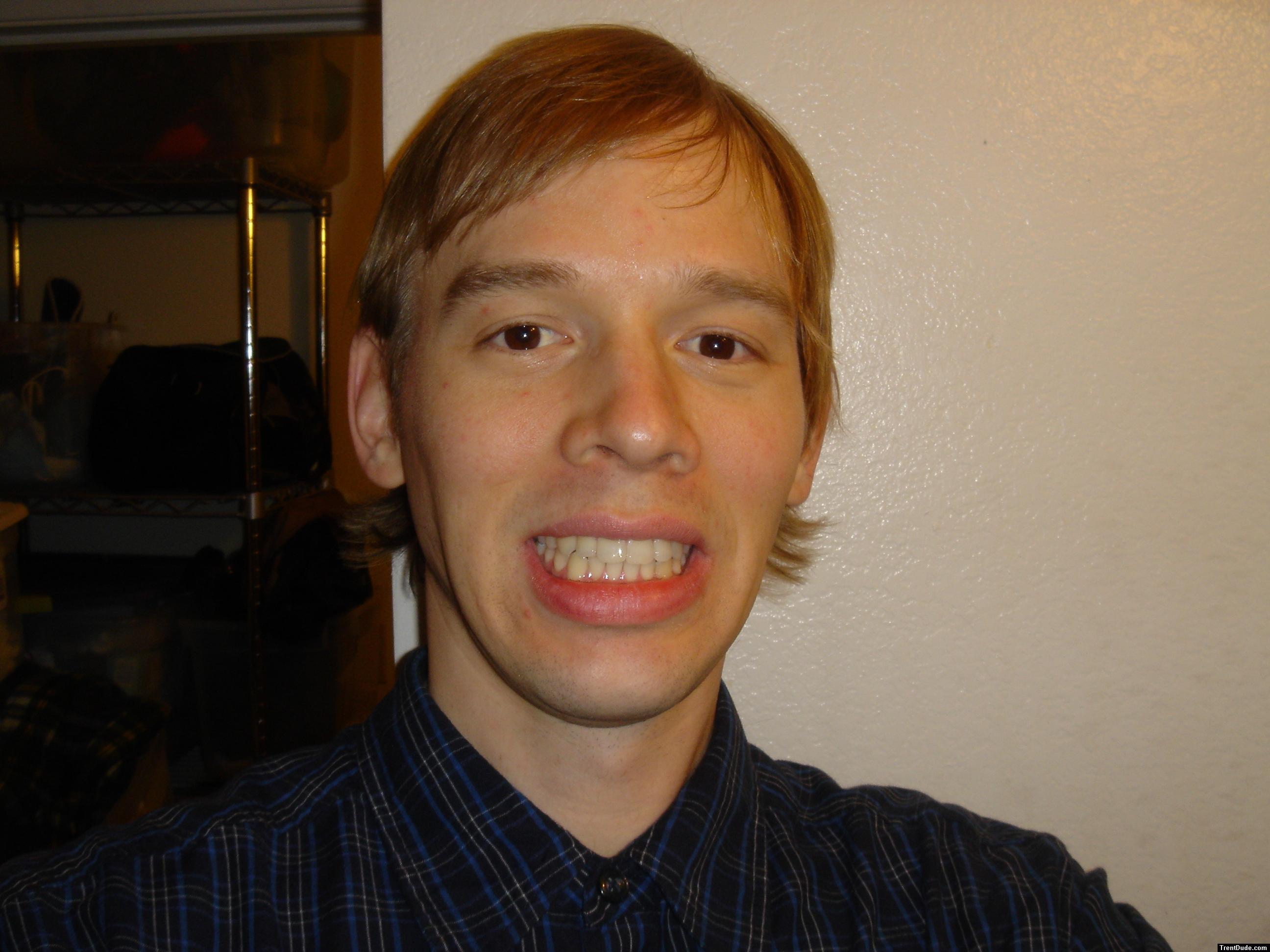 Teeth in button up shirt