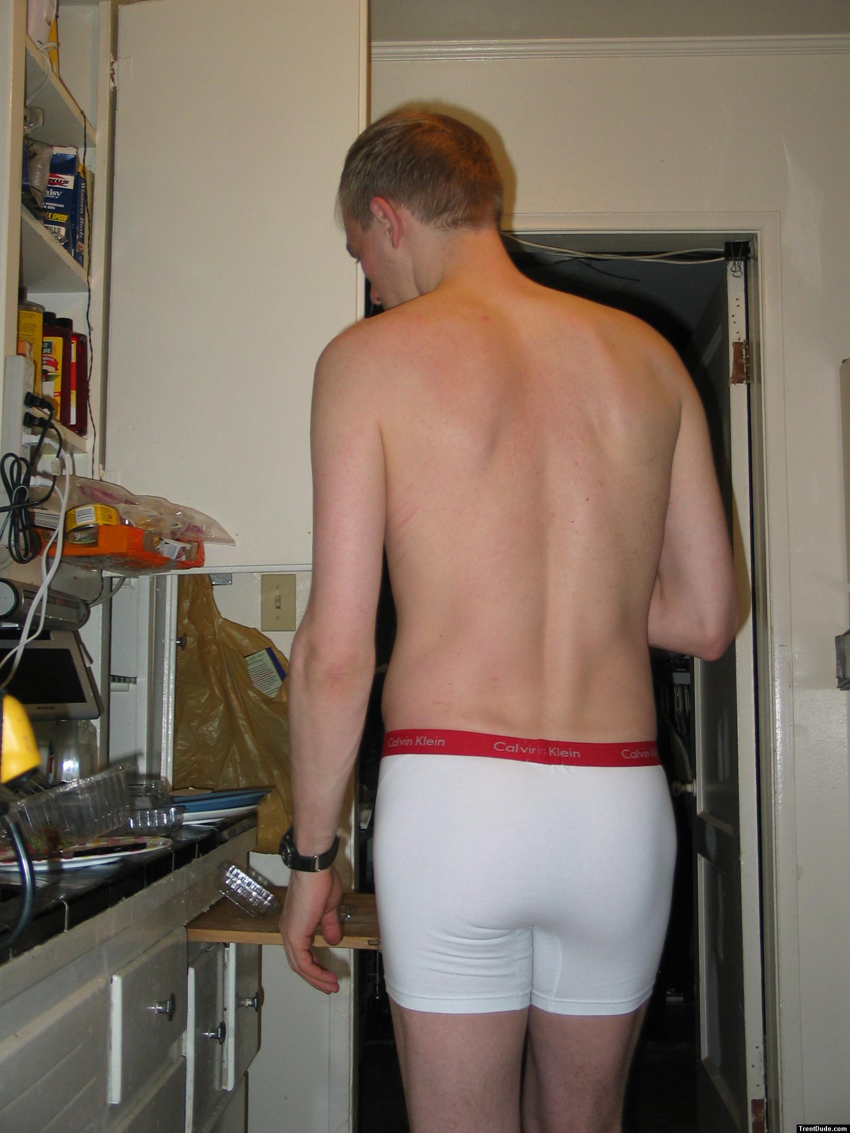 swimmer back muscles - Calvin Klein white boxer briefs in the kitchen
