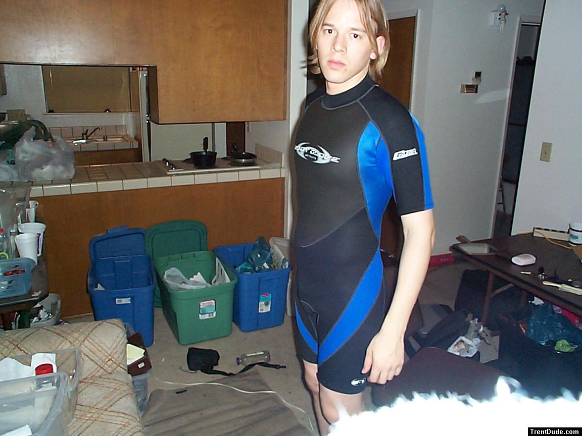 Long haired surfer in Body Glove Spring wetsuit