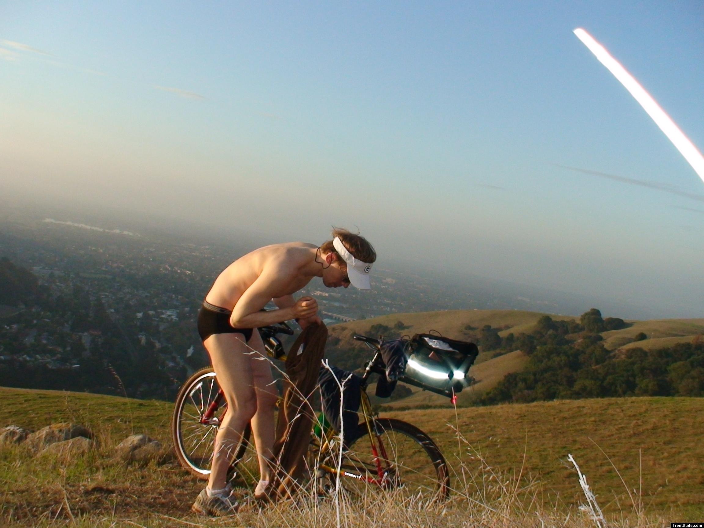 Putting on some Sweat pants to avoid the cold and sunburn