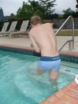 Stretching in a Calvin Klein swim boxer