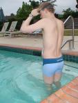 Adjusting his goggles in a Calvin Klein swim boxer