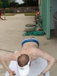 swimmer doing a push-up in a Calvin Klein swim boxer