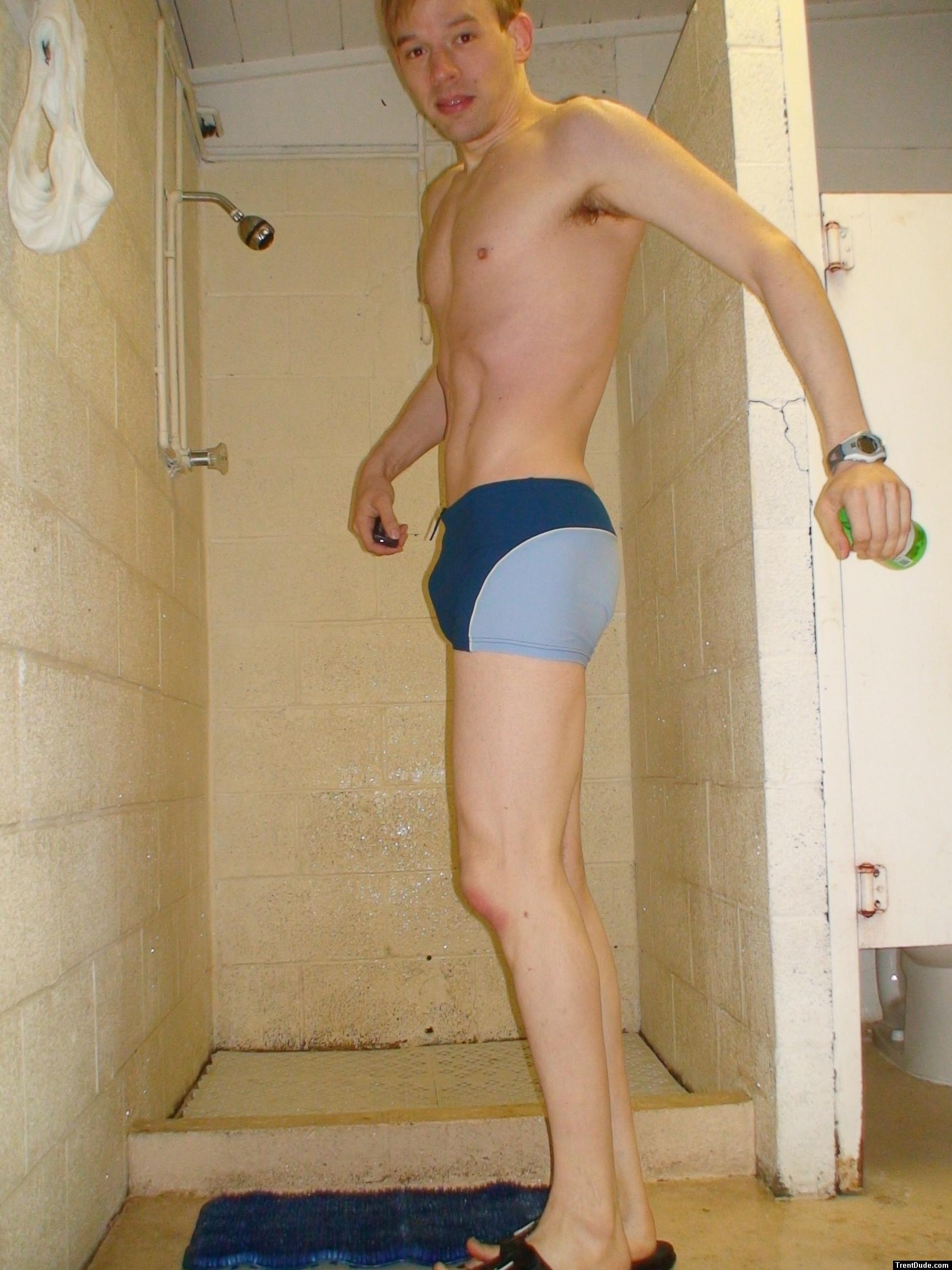 Swimmer in a swim boxer (flexing abs)