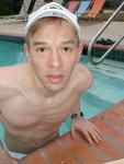 Swimmer in a white speedo