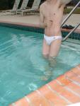 faceless Swimmer in a white speedo (armpit)