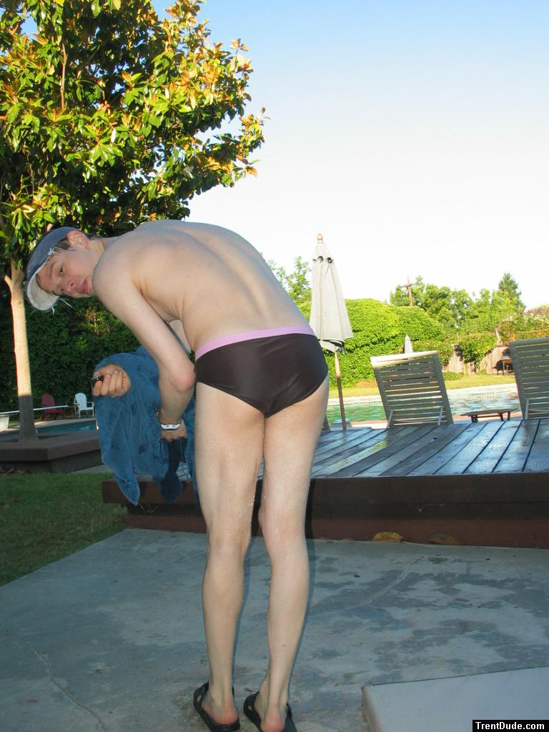 Bending over to dry his feet
