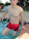 Swimmer in a red speedo square leg suit!