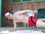 Doing some one armed push-ups after a swim