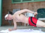 Doing some one armed push-ups after a swim