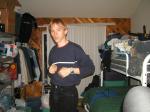 Trent in a blue shirt and black Levi's jeans