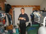 Trent in a blue shirt and black Levi's jeans