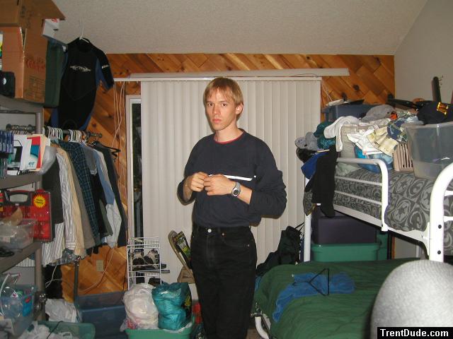 Trent in a blue shirt and black Levi's jeans