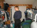Trent in a blue shirt and black Levi's jeans