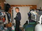 Trent in a blue shirt and black Levi's jeans