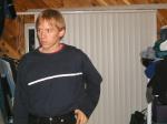 Trent in a blue shirt and black Levi's jeans