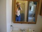 shirtless dude in a mirror with underwear showing (skinny)