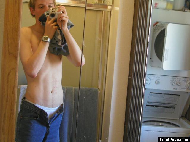 shirtless dude in a mirror with underwear showing (skinny)