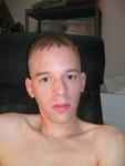 Trent shirtless with short hair