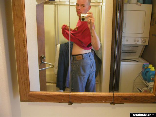 Trent with jeans in the mirror