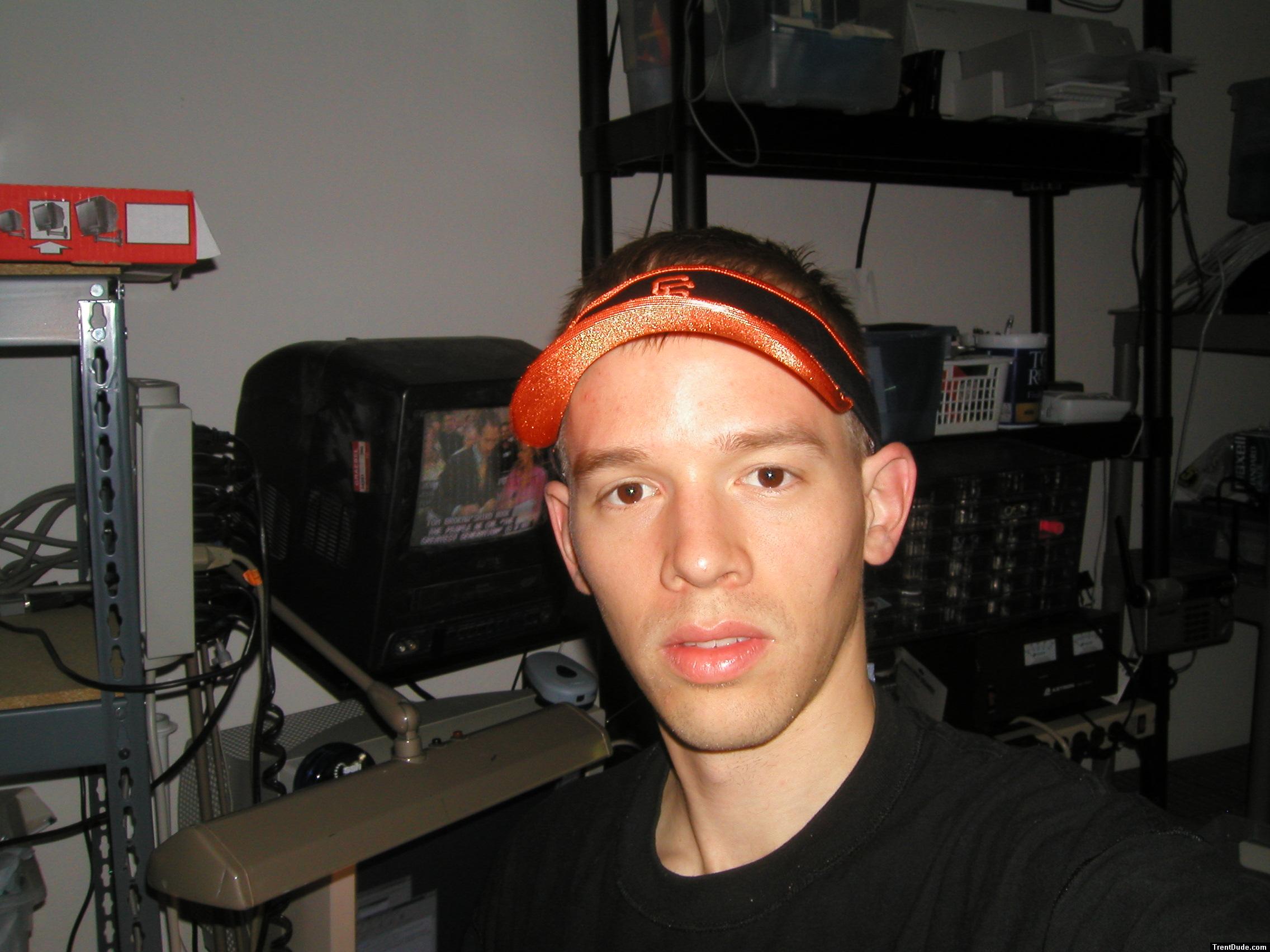 Trent wearing a SF Giants visor hat