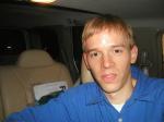 Trent in a blue shirt