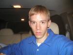 Trent in a blue shirt