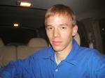 Trent in a blue shirt