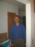 Trent in a blue shirt